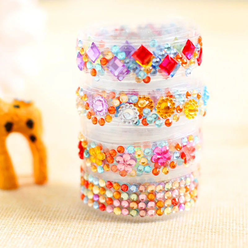 Three colorful hair ties with beads and crystals on a light background