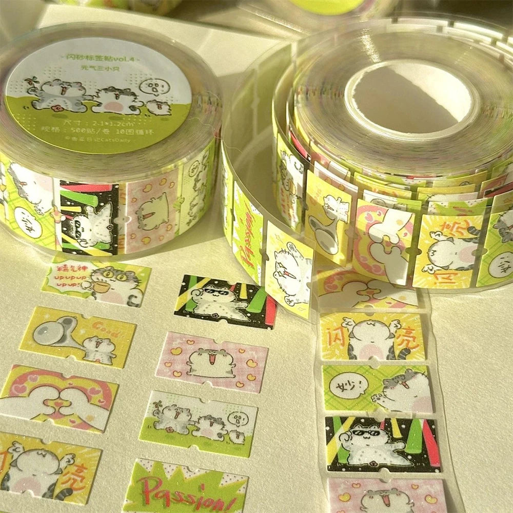 Rolls of decorative stickers with cartoon designs on a light surface.