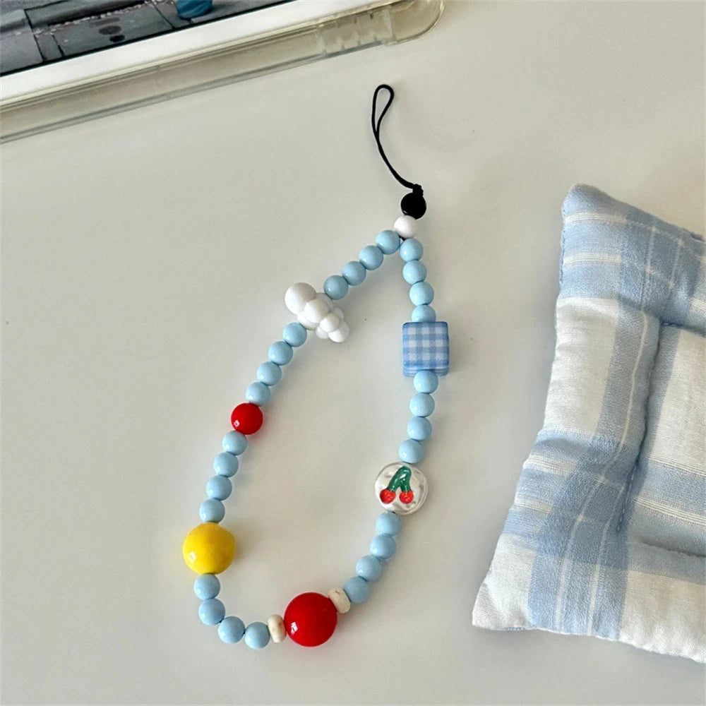 Cloud and Cherry Blue Beaded Wrist Strap