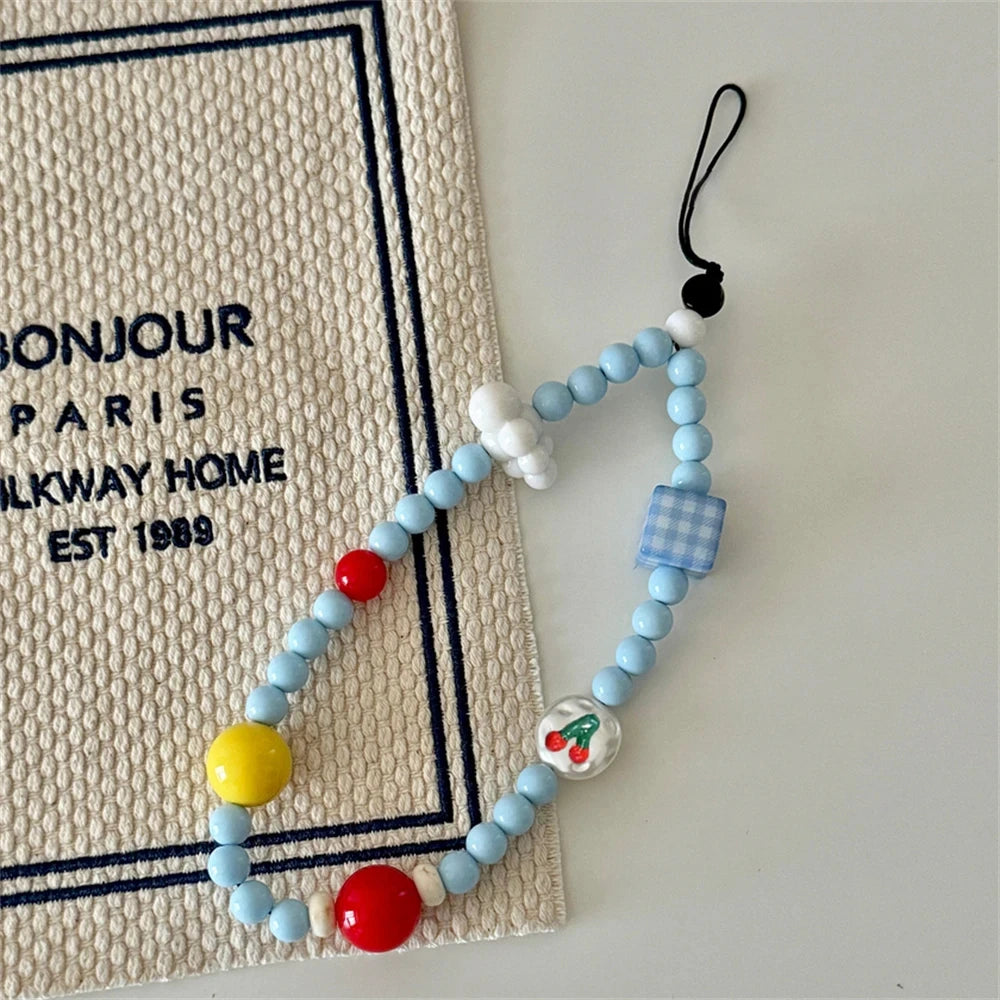 Cloud and Cherry Blue Beaded Wrist Strap