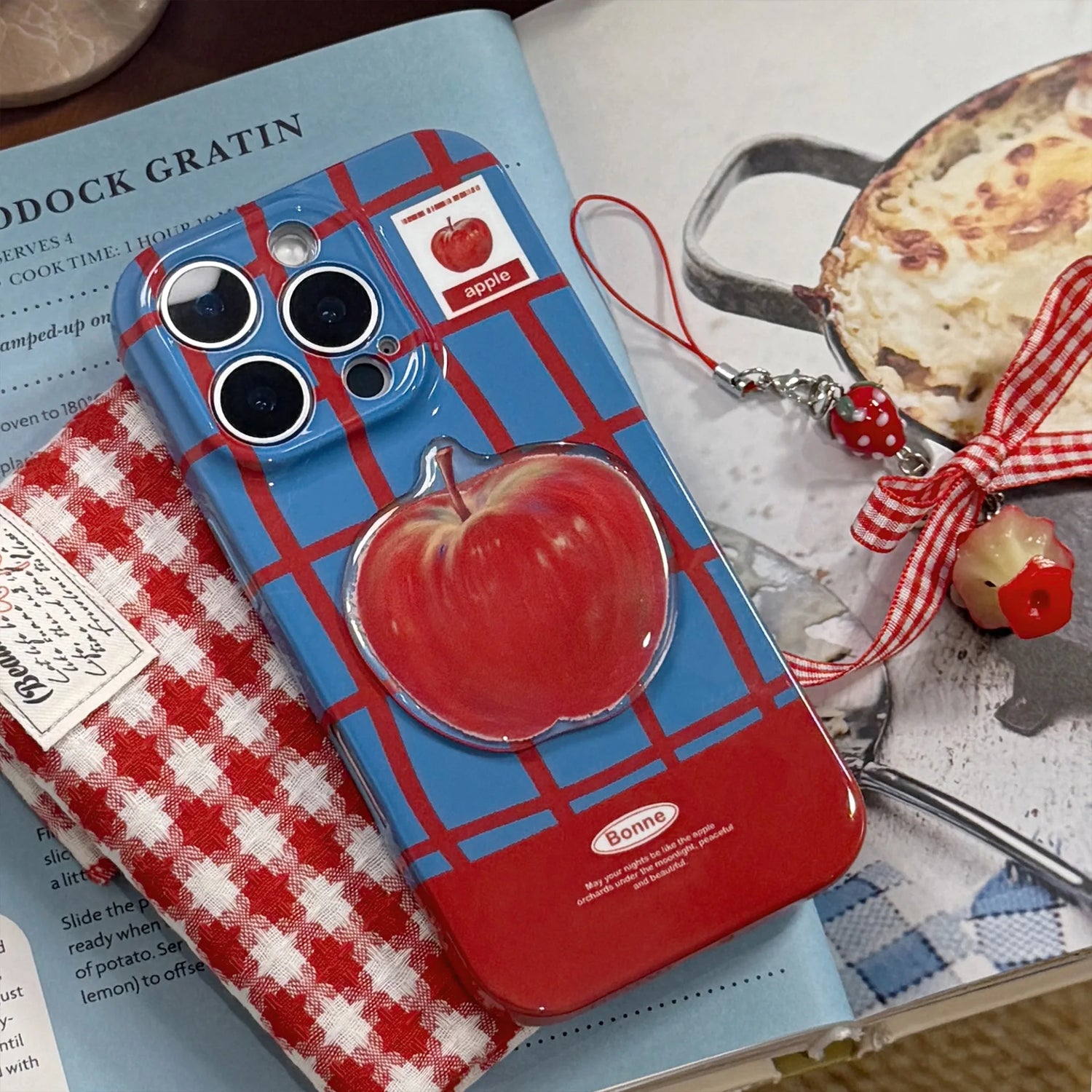 Phone case with apple design on a magazine
