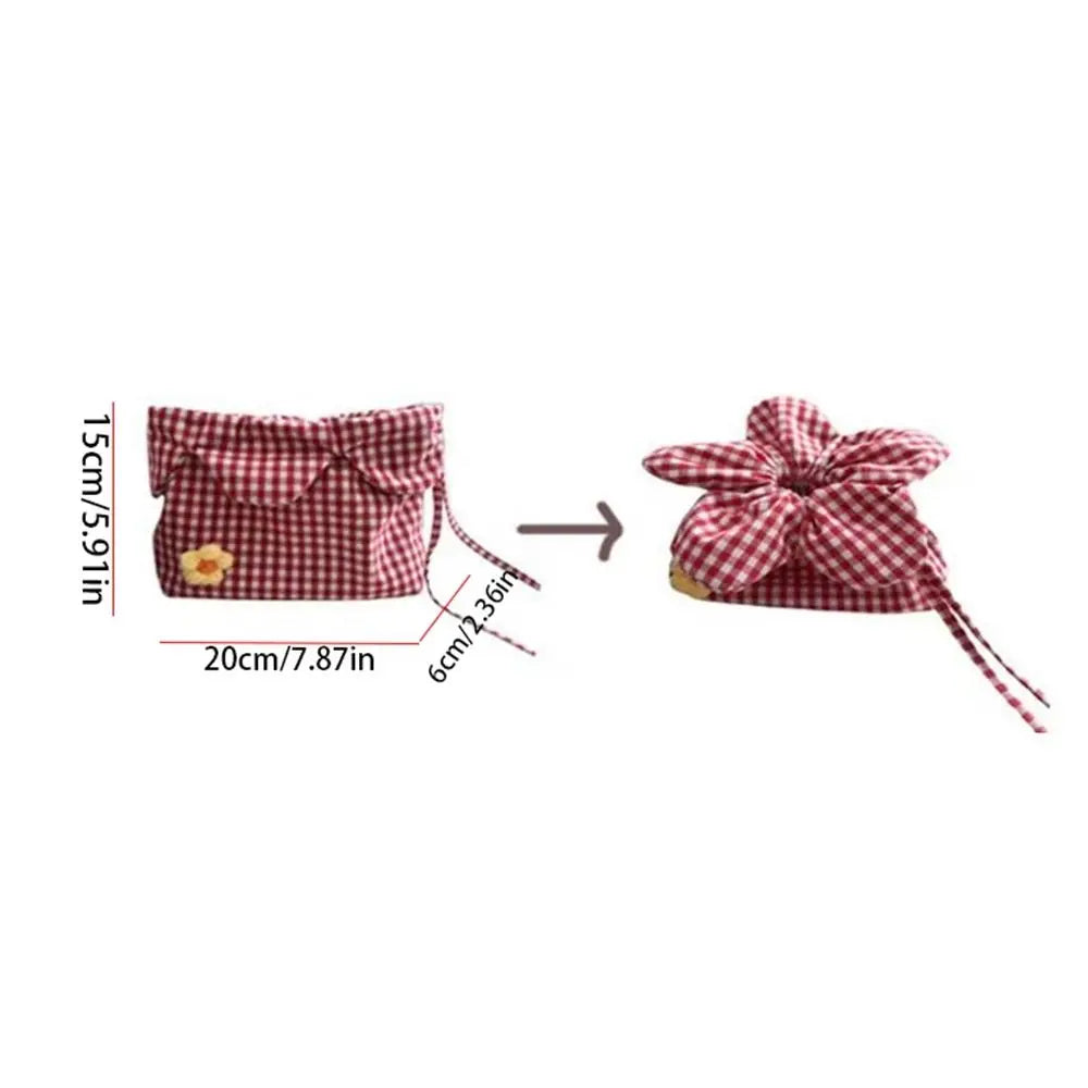 Red and white checkered pouch with measurements on a white background