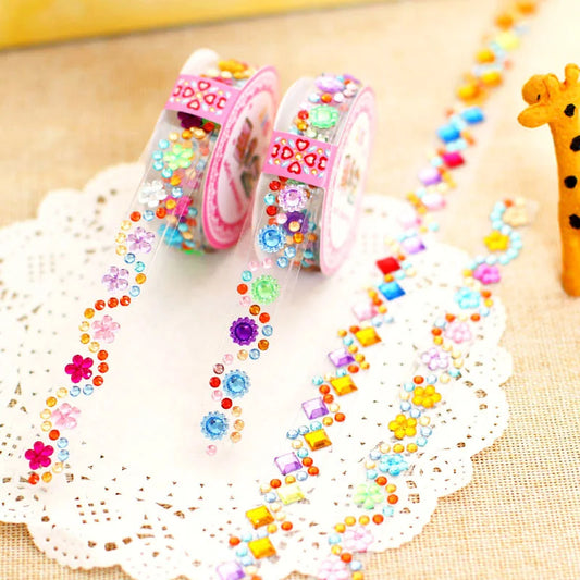 Decorative tape with colorful embellishments on a lace background