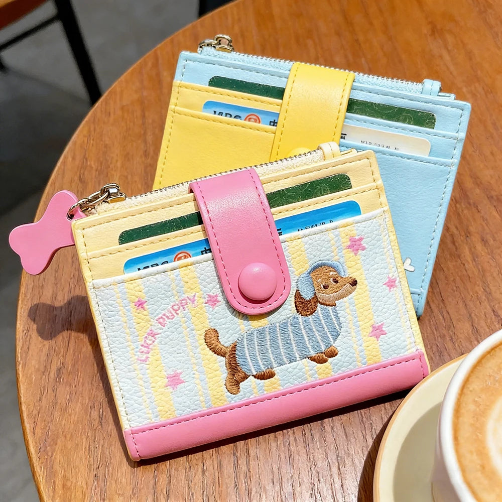 Colorful cardholder with cartoon dog design on a wooden table