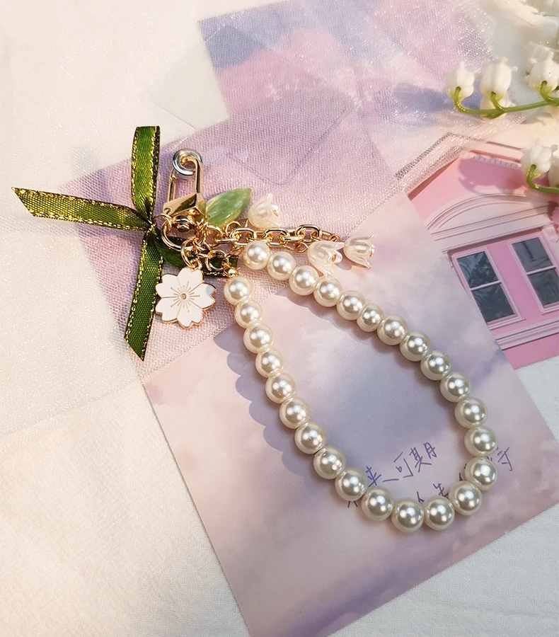 Pearlescent Lilies Clip On Wrist Strap
