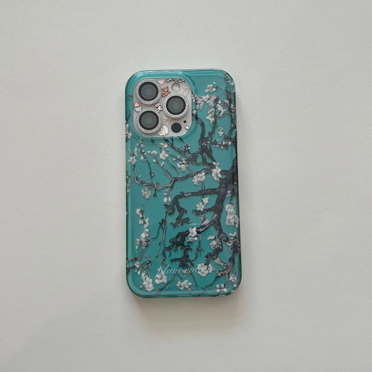 Phone case with floral design on a gray background