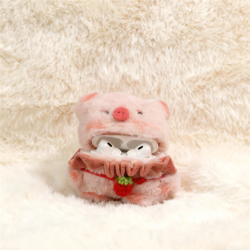 Pink cartoon-style case with a strawberry design on a fluffy white background