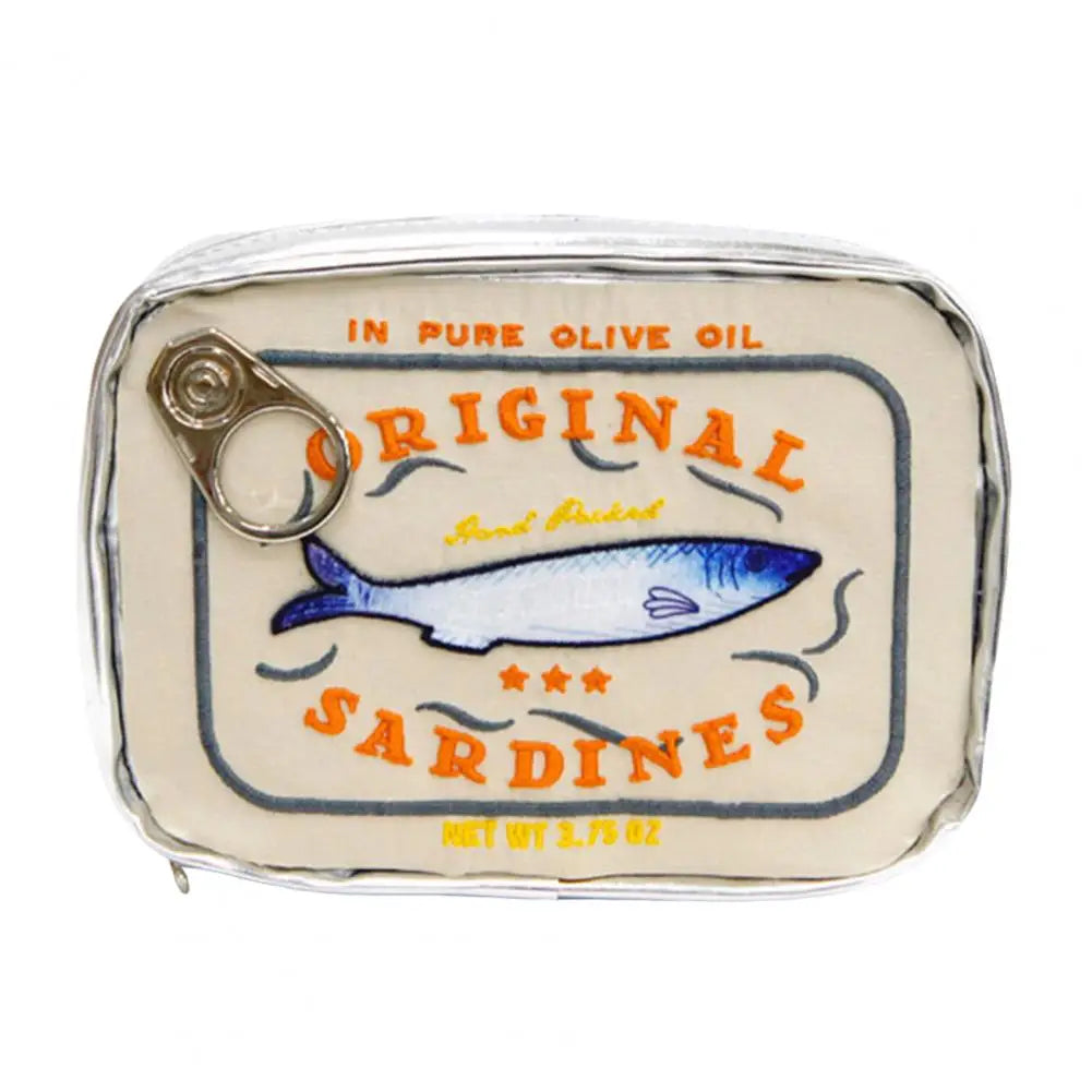 A novelty pouch designed to look like a vintage can of 'Original Sardines' in pure olive oil, featuring a cream-colored label with orange text, a blue and white fish illustration, and a silver pull-tab zipper closure.
