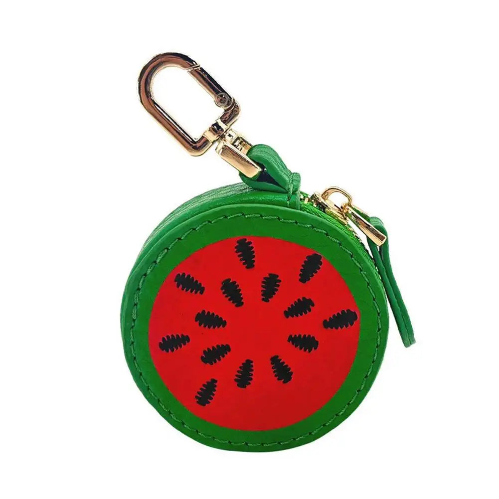 Watermelon-patterned keychain pouch with green border on a white background