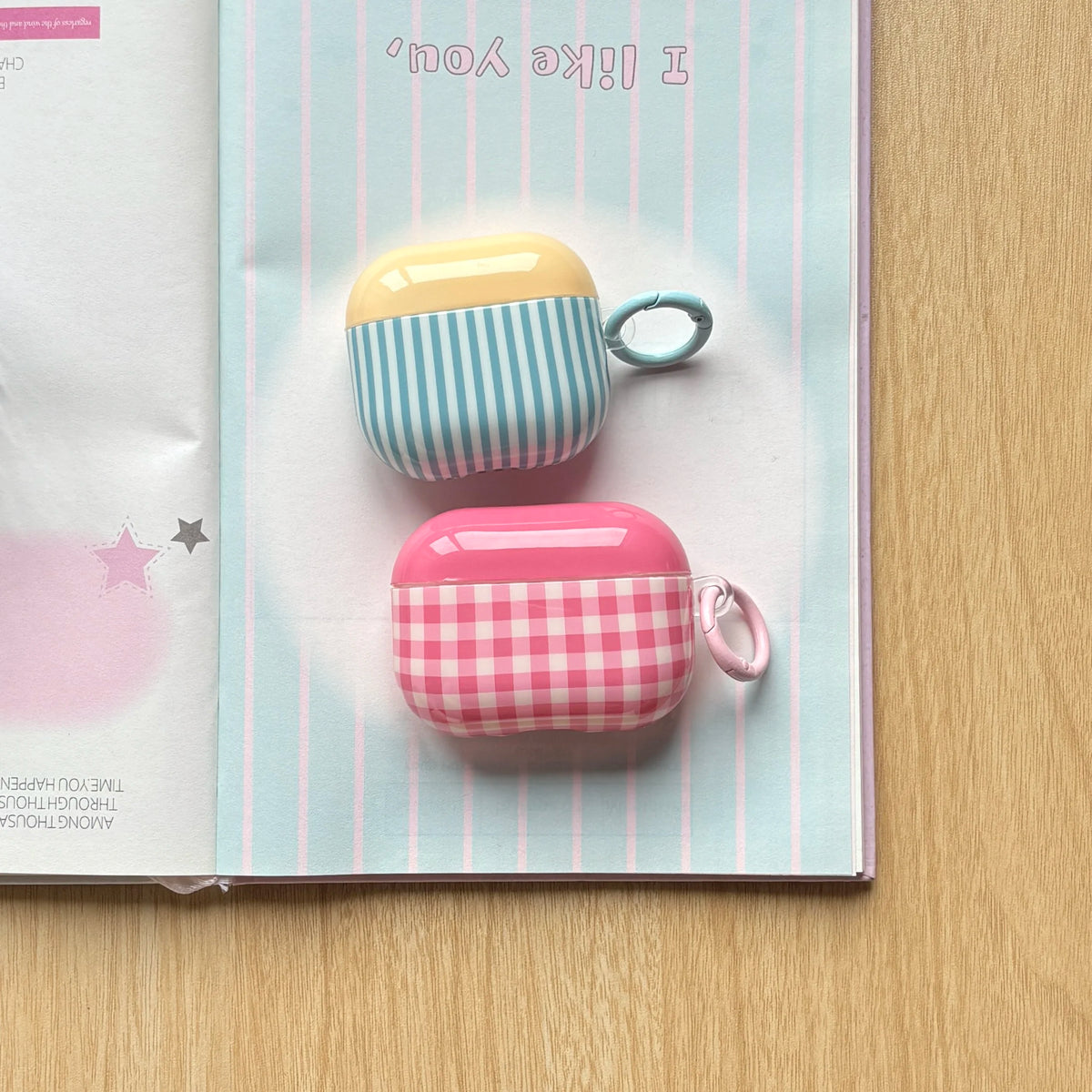 Two small cases, one striped and one checkered, on a light blue background with 'I like you' text.