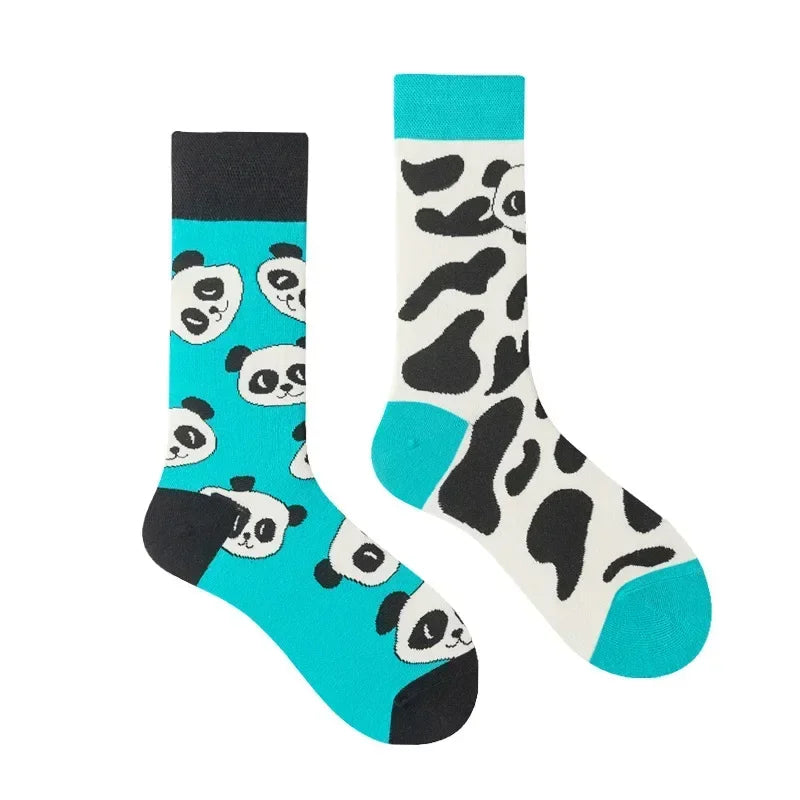 Two socks with panda patterns on a white background