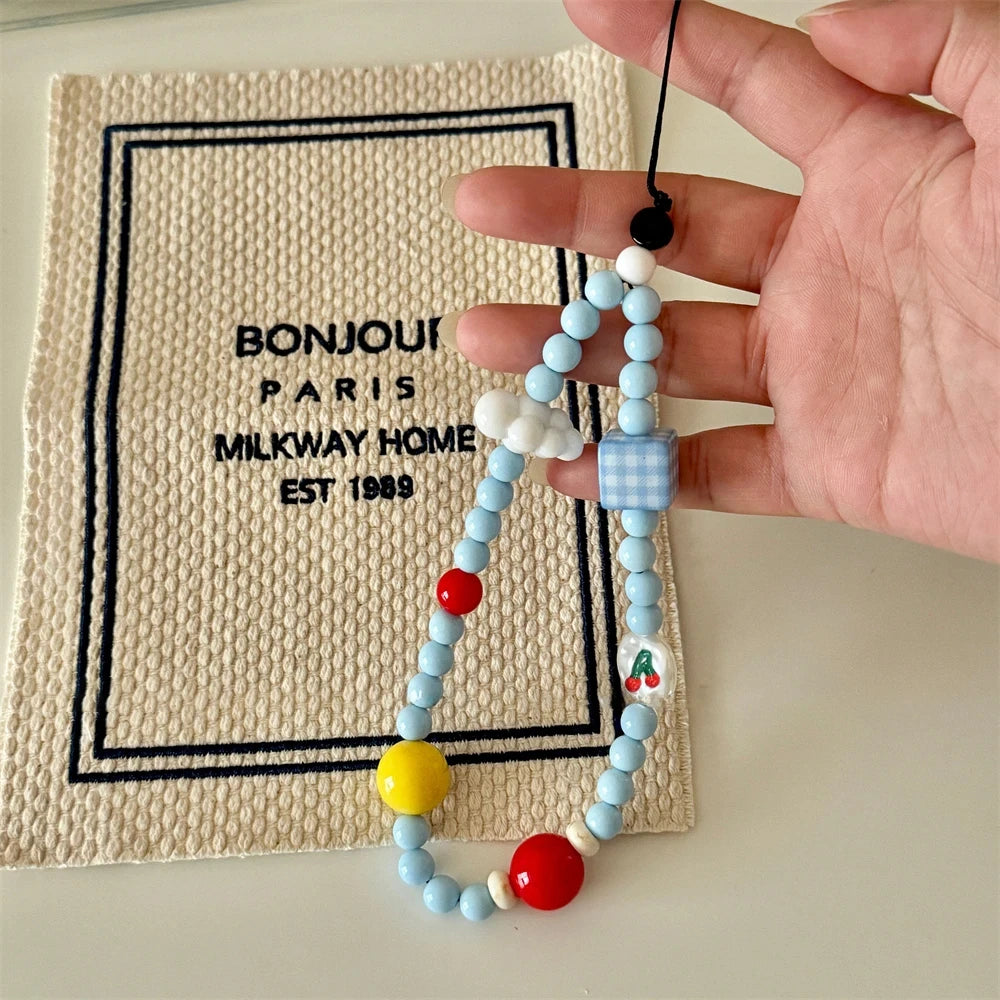 Cloud and Cherry Blue Beaded Wrist Strap