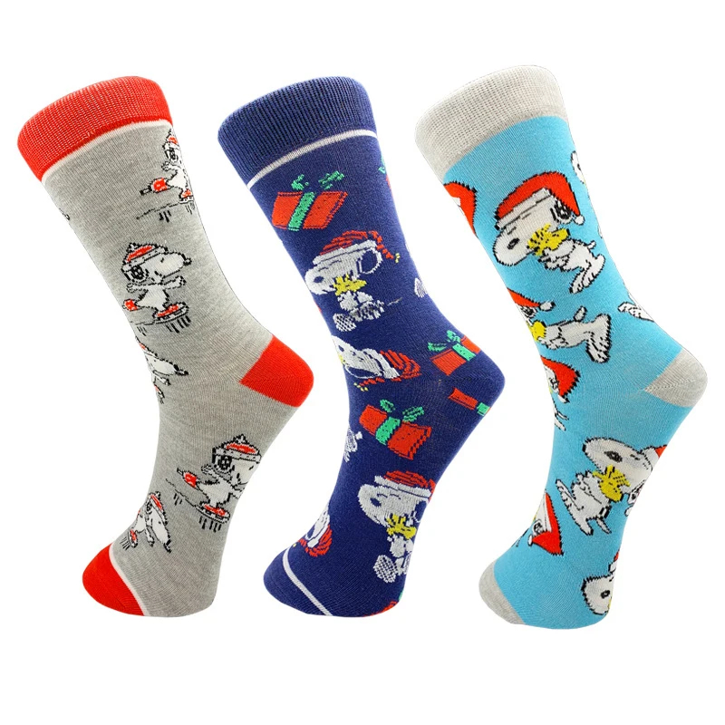 Three pairs of Christmas-themed socks with cartoon characters on a white background