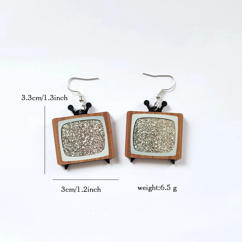 Pair of earrings resembling small TVs on a white background with measurements and weight displayed.