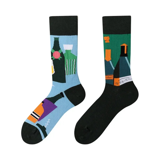 Two socks with wine bottle and glass designs on a white background